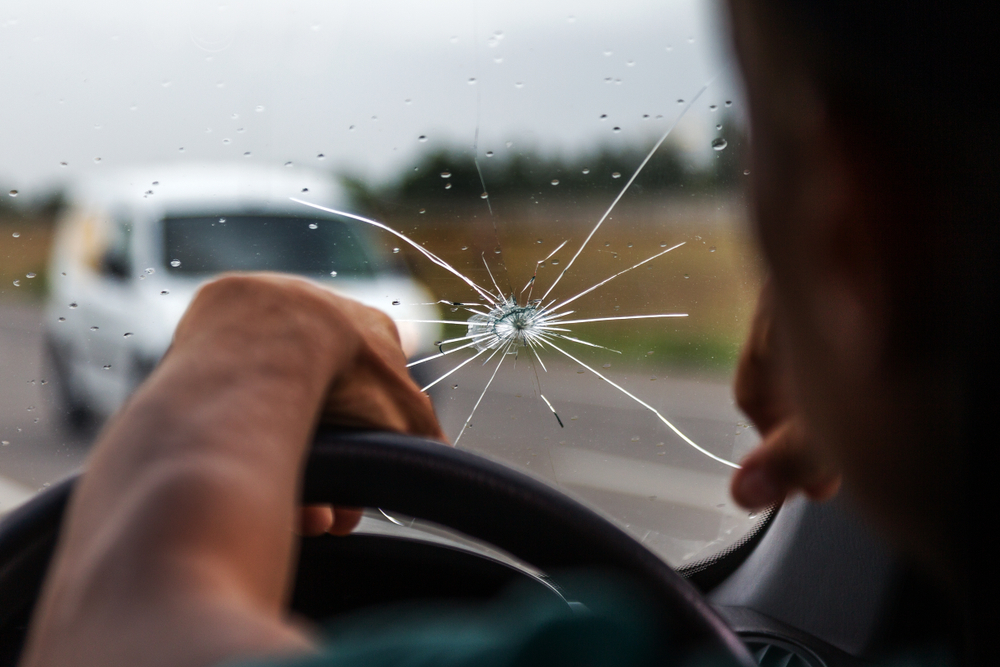 What Is a Deductible in Car Insurance - An image of a cracked windshield.