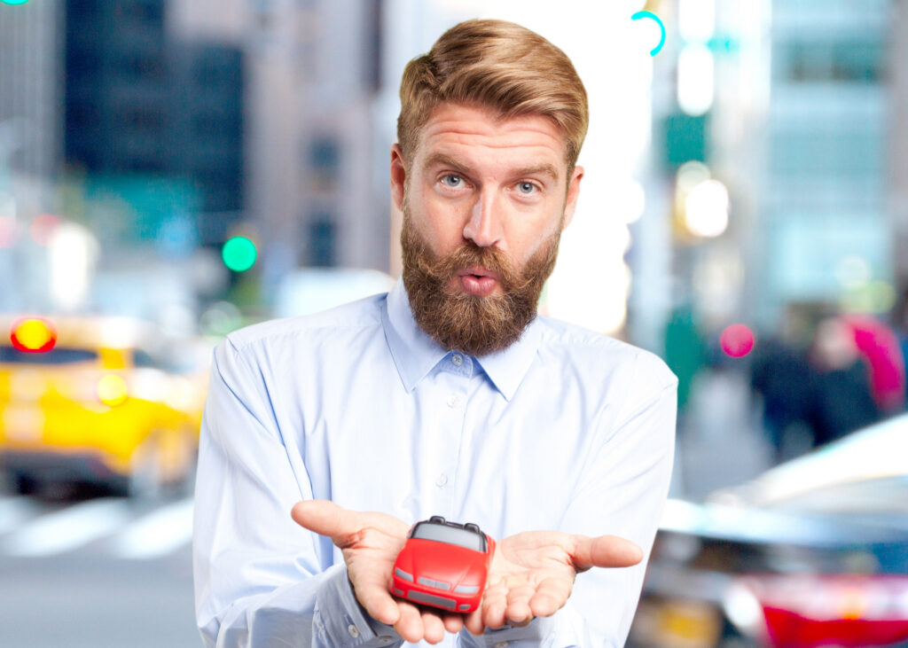 Surprised blond man looking at the camera