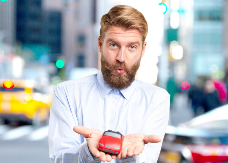Surprised blond man looking at the camera