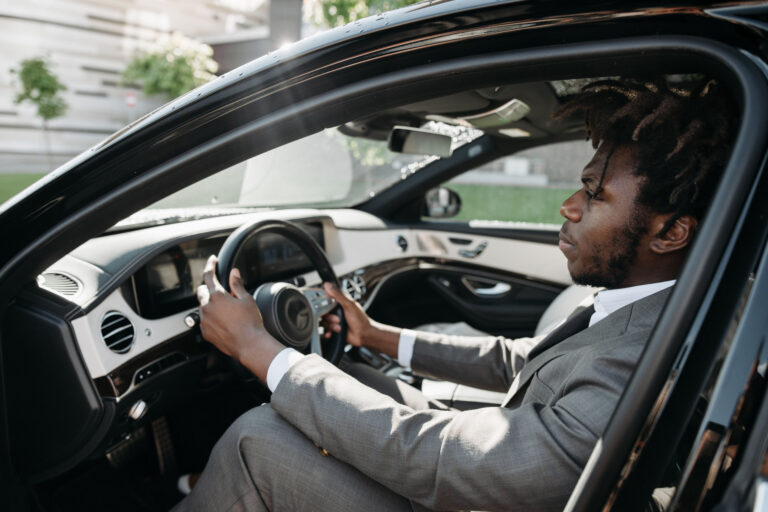 Driver reviewing high-risk auto insurance coverage and SR-22 requirements with an advisor